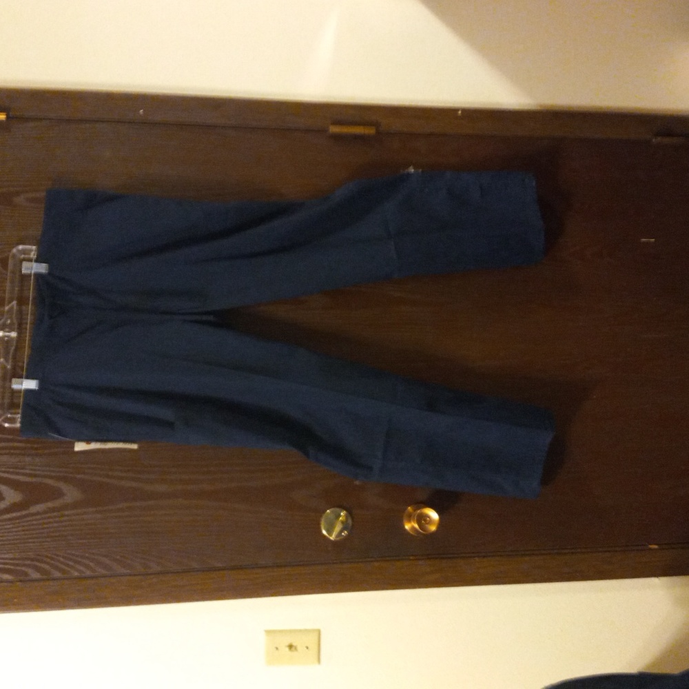 Salus navy blue uniform new with tag. Size M top and bottom.